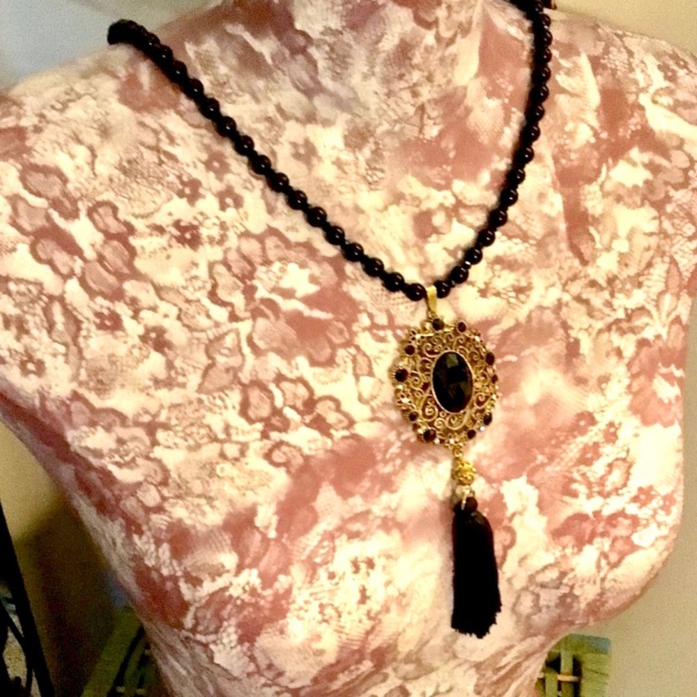 Black and Gold Beaded Necklace with Tassel Pendant. NWT!